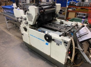 Envelope production machine